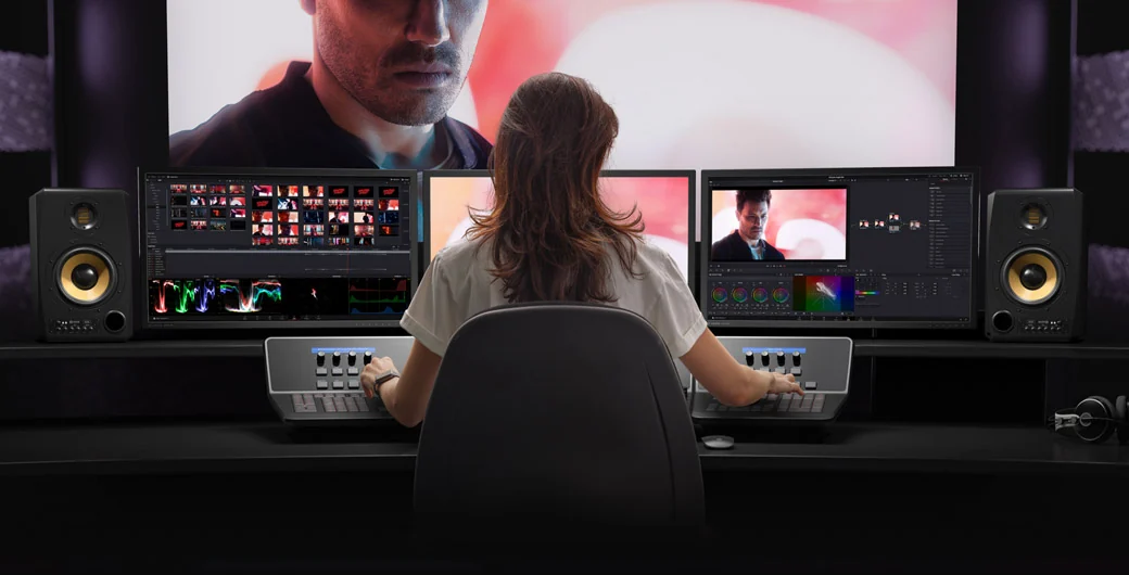 Blackmagic Design’s promotional image of a colorist at a DaVinci Resolve workstation. Not a short-form setup recommendation or an in-house test.